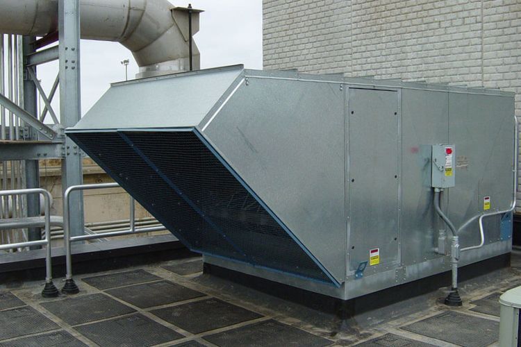 Commercial rooftop HVAC unit repair and maintained for reliable, energy-efficient climate control services